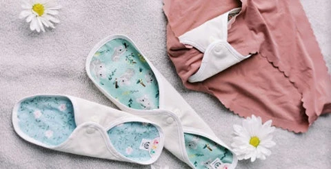 A reusable cloth pads clipped on to underwear